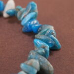 Close-up of irregular blue apatite bracelet.