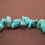 Close-up of irregular turquoise bracelet.