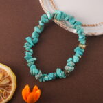 Turquoise bracelet in natural light with earthy tones.