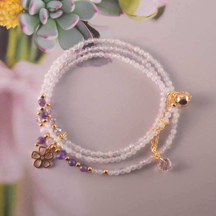 Full view of the lavender and Uruguayan amethyst necklace laid flat, showing the arrangement of beads for convertible styling.