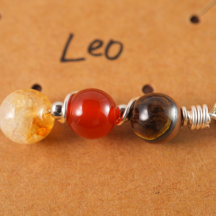 Detailed view of Leo necklace featuring tiger eye, red jasper, and citrine.