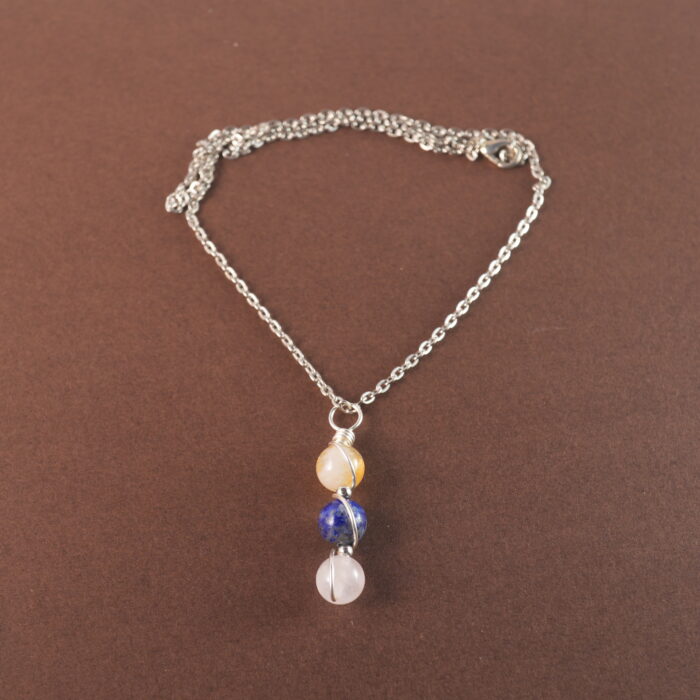 Libra zodiac necklace with citrine, lapis lazuli, and clear quartz gemstones.