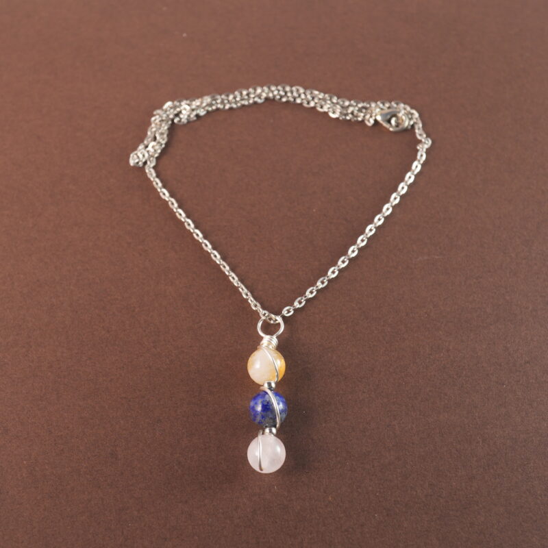 Libra zodiac necklace with citrine, lapis lazuli, and clear quartz gemstones.