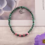 Bracelet in natural light showing rich green and soft pink.