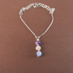 Pisces zodiac necklace with amethyst, crazy agate, and aquamarine gemstones.