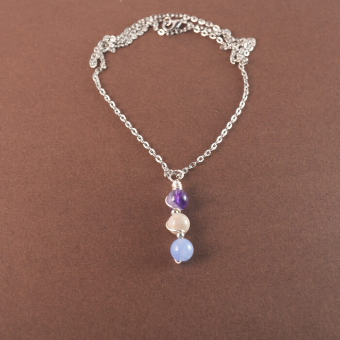Pisces zodiac necklace with amethyst, crazy agate, and aquamarine gemstones.