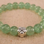 Close-up of prehnite bracelet with S925 silver beads.