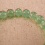 Close-up of prehnite bracelet with S925 silver beads.