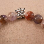 Close-up of purple phantom quartz bracelet with S925 silver.
