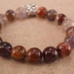 Close-up of purple phantom quartz bracelet with S925 silver.