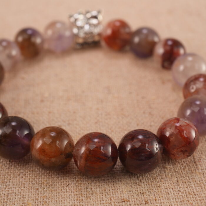 Close-up of purple phantom quartz bracelet with S925 silver.