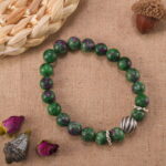Ruby in zoisite S925 bracelet in natural light, showing green and red mix.