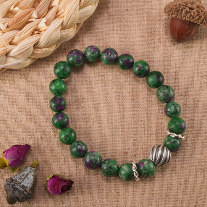 Ruby in zoisite S925 bracelet in natural light, showing green and red mix.