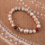 Shoushan stone bracelet in natural light with warm beige color.
