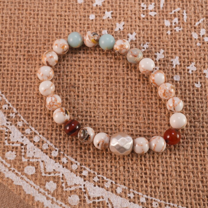 Shoushan stone bracelet in natural light with warm beige color.
