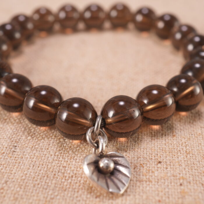 Close-up of smoky quartz bracelet with S925 silver beads.
