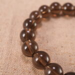 Close-up of smoky quartz bracelet with S925 silver components.