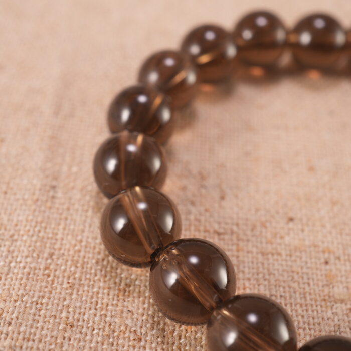 Close-up of smoky quartz bracelet with S925 silver components.