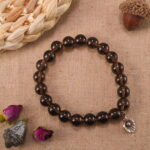 Smoky quartz bracelet in natural light showing soft smoky hues.