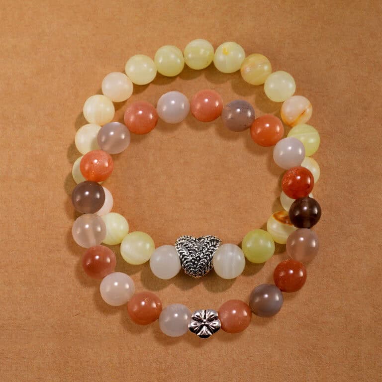 Main image of stacked Afghan jade and moonstone bracelets as a set.