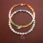 Main image of stacked amazonite and multicolor chalcedony bracelets.