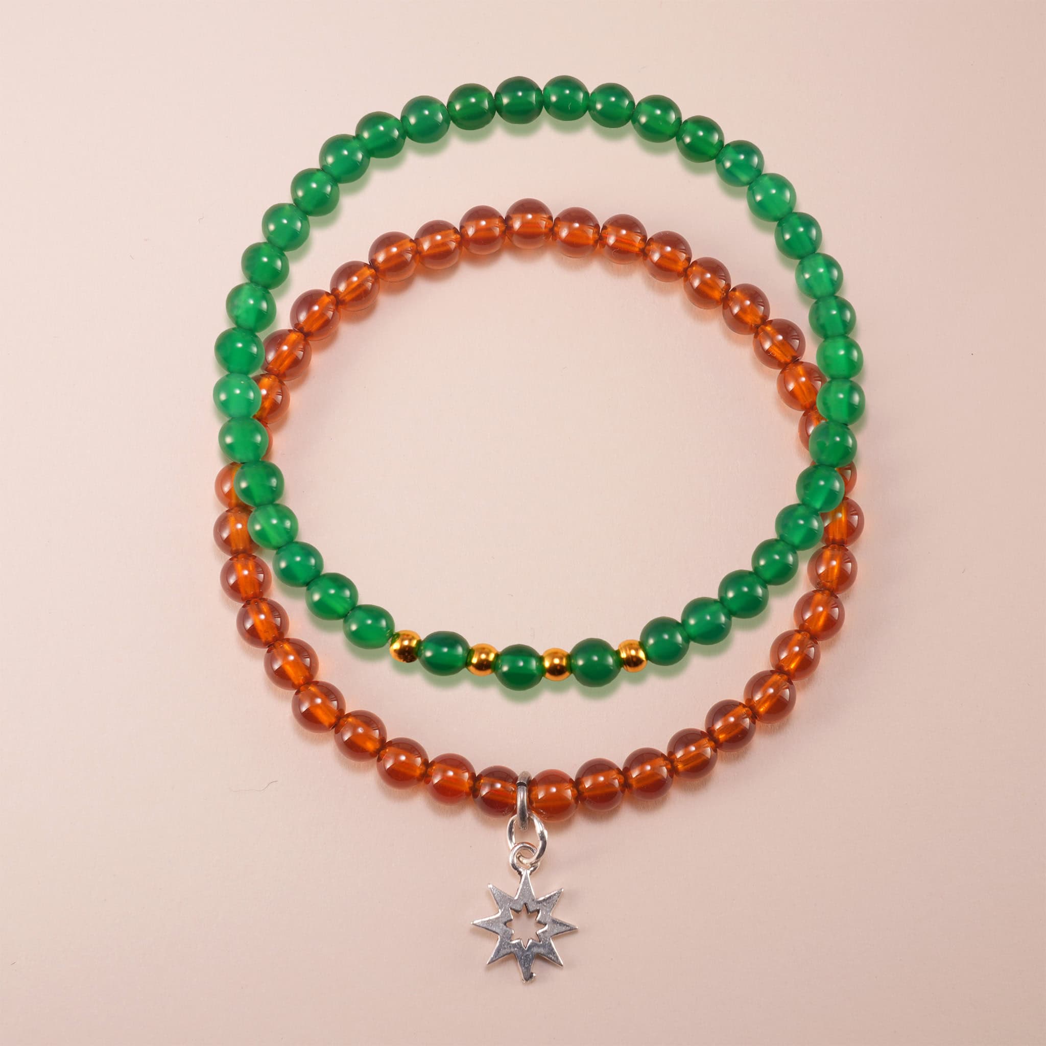 stacked-bracelets-garnet-green-chalcedony-main Main image of stacked garnet and green chalcedony bracelets.