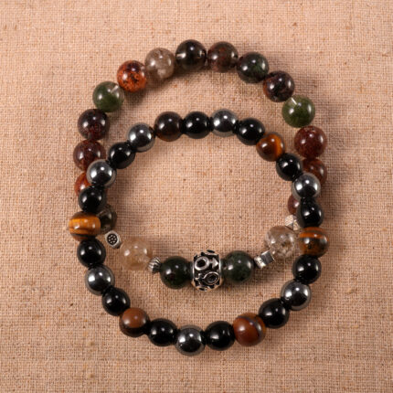 Main image of stacked bracelets with phantom quartz and dark stone mix.