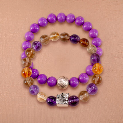 Main image showing stacked phosphosiderite and ametrine bracelets as a set.