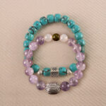 Main image of stacked bracelets: turquoise and lavender-white gemstone combo.