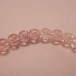 Close-up of strawberry quartz bracelet with silver.