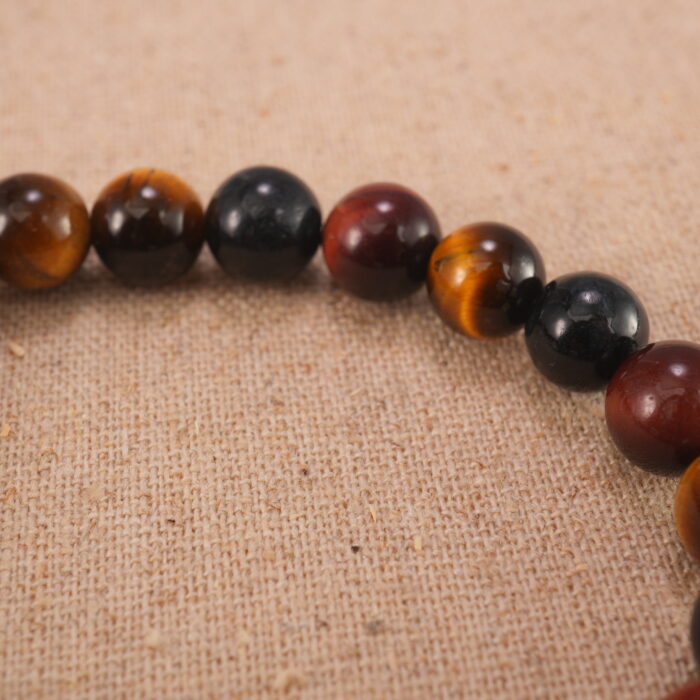 Close-up of tiger eye bracelet with S925 silver beads.