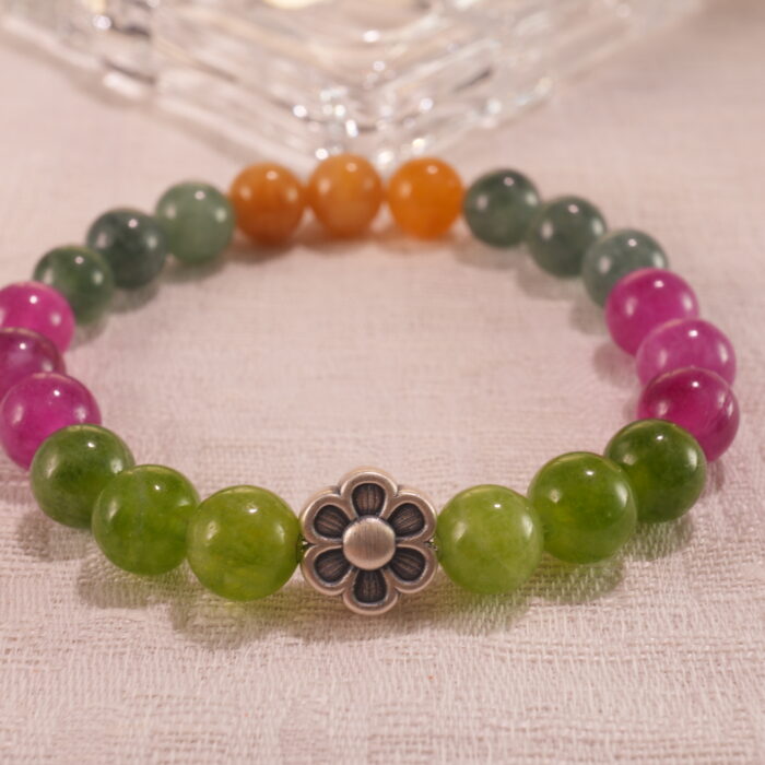 Close-up of tourmaline bracelet showing multicolored crystal beads.