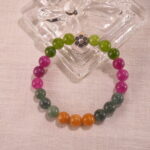 Tourmaline bracelet displayed in natural light with soft background.