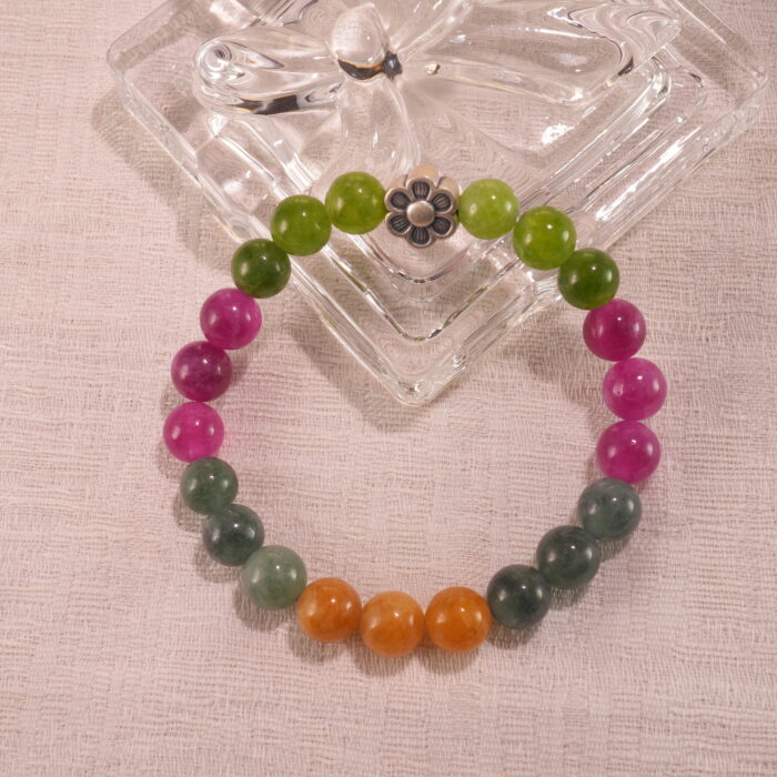 Tourmaline bracelet displayed in natural light with soft background.