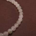 Close-up of white chalcedony bracelet with silver.
