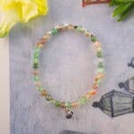 Bracelet in daylight with bright and translucent beads.