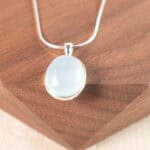 Close-up of aquamarine gemstone and pendant setting