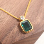 Close-up of emerald pendant necklace details