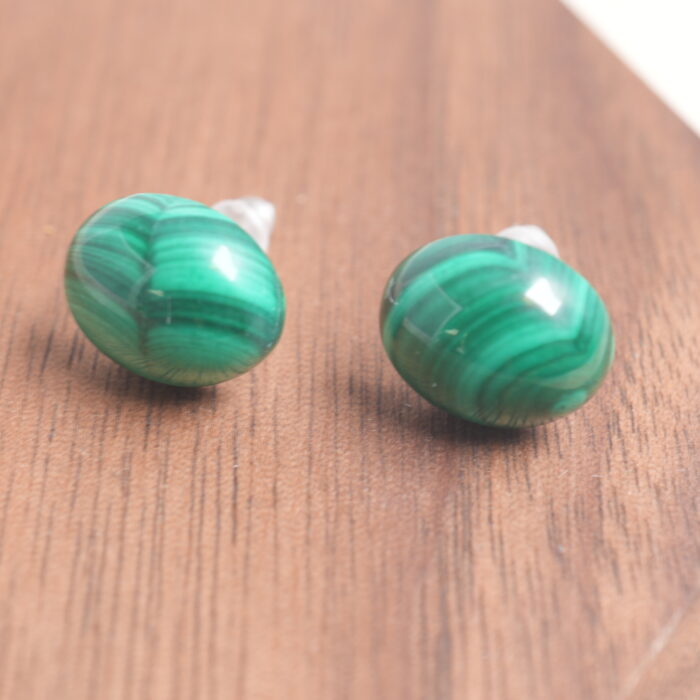 Close-up of the malachite stud earring, highlighting its unique green banding and polished finish.