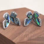 Close-up of the moonstone butterfly earring, showing delicate wing details and its dreamy sheen.