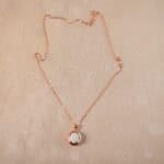 Opal pendant on white background