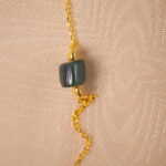 Close-up of colorful tourmaline beads on delicate necklace