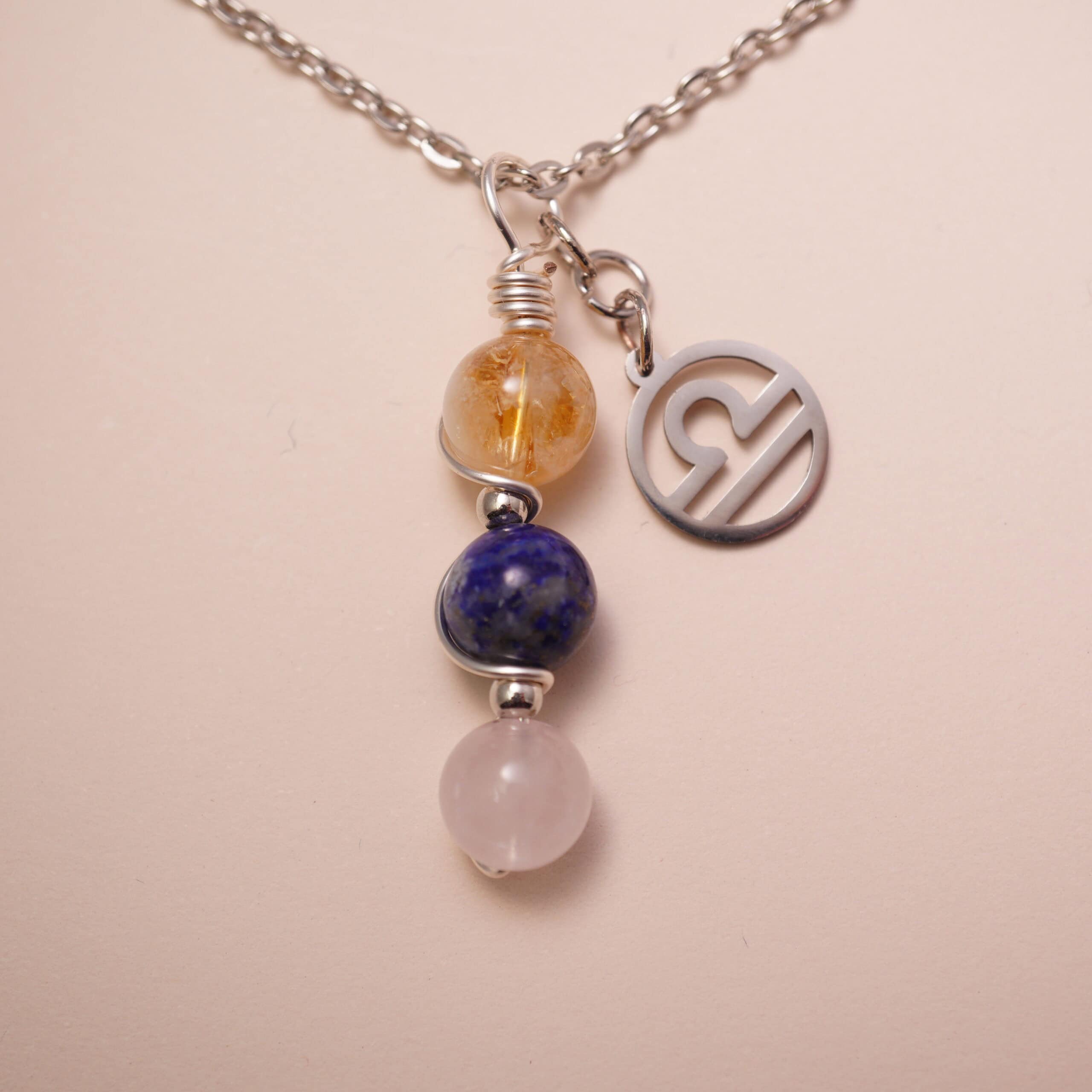 libra-zodiac-necklace-citrine-lapis-lazuli-clear-quartz-main Libra zodiac necklace with citrine, lapis lazuli, and clear quartz gemstones.