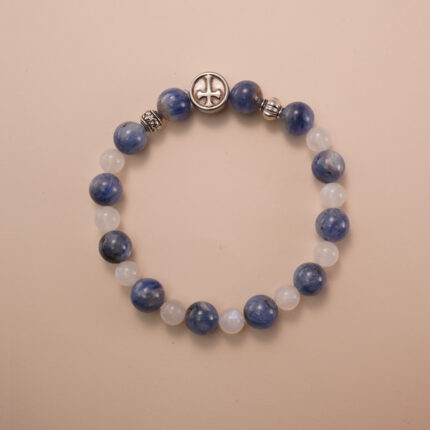 Kyanite and moonstone bracelet with silver accent beads, photographed under soft daylight on a neutral background.
