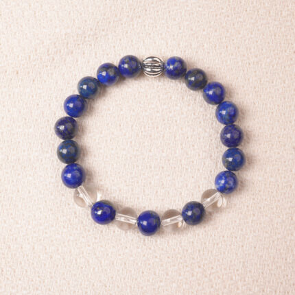 Lapis lazuli and clear quartz bracelet with silver accent, symbolizing calmness, clarity, and open communication.