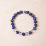 Lapis lazuli and clear quartz bracelet with silver accent, symbolizing calmness, clarity, and open communication.