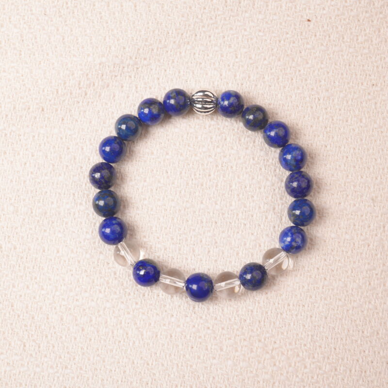 Lapis lazuli and clear quartz bracelet with silver accent, symbolizing calmness, clarity, and open communication.