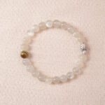 Moonstone bracelet with soft white shimmer, symbolizing calm energy and emotional balance.