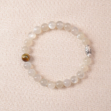 Moonstone bracelet with soft white shimmer, symbolizing calm energy and emotional balance.