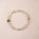 Moonstone bracelet with soft white shimmer, symbolizing calm energy and emotional balance.